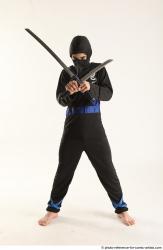 Man Young Athletic Fighting with sword Standing poses Casual Asian